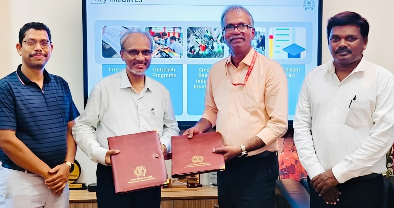 Officials holding documents after signing a tripartite agreement for shipyard modernisation under India's Shipbuilding Development Scheme - Maritime News